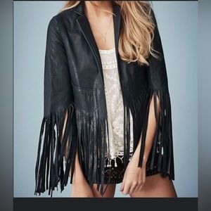 Kate Moss + Top Shop navy fringe leather jacket.